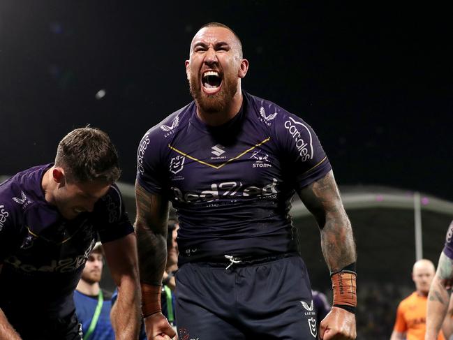 MELBOURNE, AUSTRALIA - SEPTEMBER 15: Nelson Asofa-Solomona of the Storm celebrates the try of Will Warbrick of the Storm during the NRL Semi Final match between Melbourne Storm and the Sydney Roosters at AAMI Park on September 15, 2023 in Melbourne, Australia. (Photo by Kelly Defina/Getty Images)