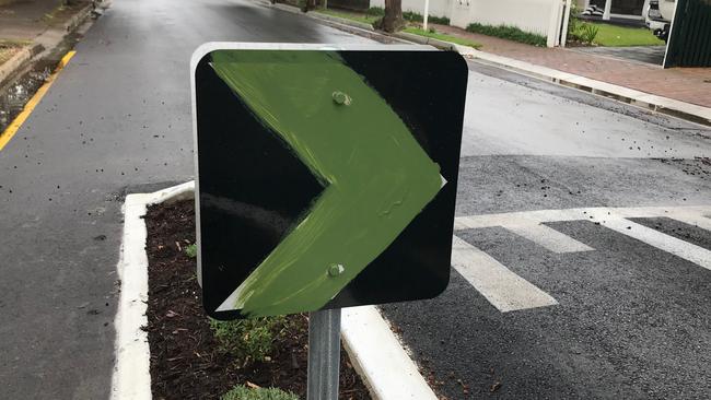 A sign painted in green. Picture: Jessica Adams.