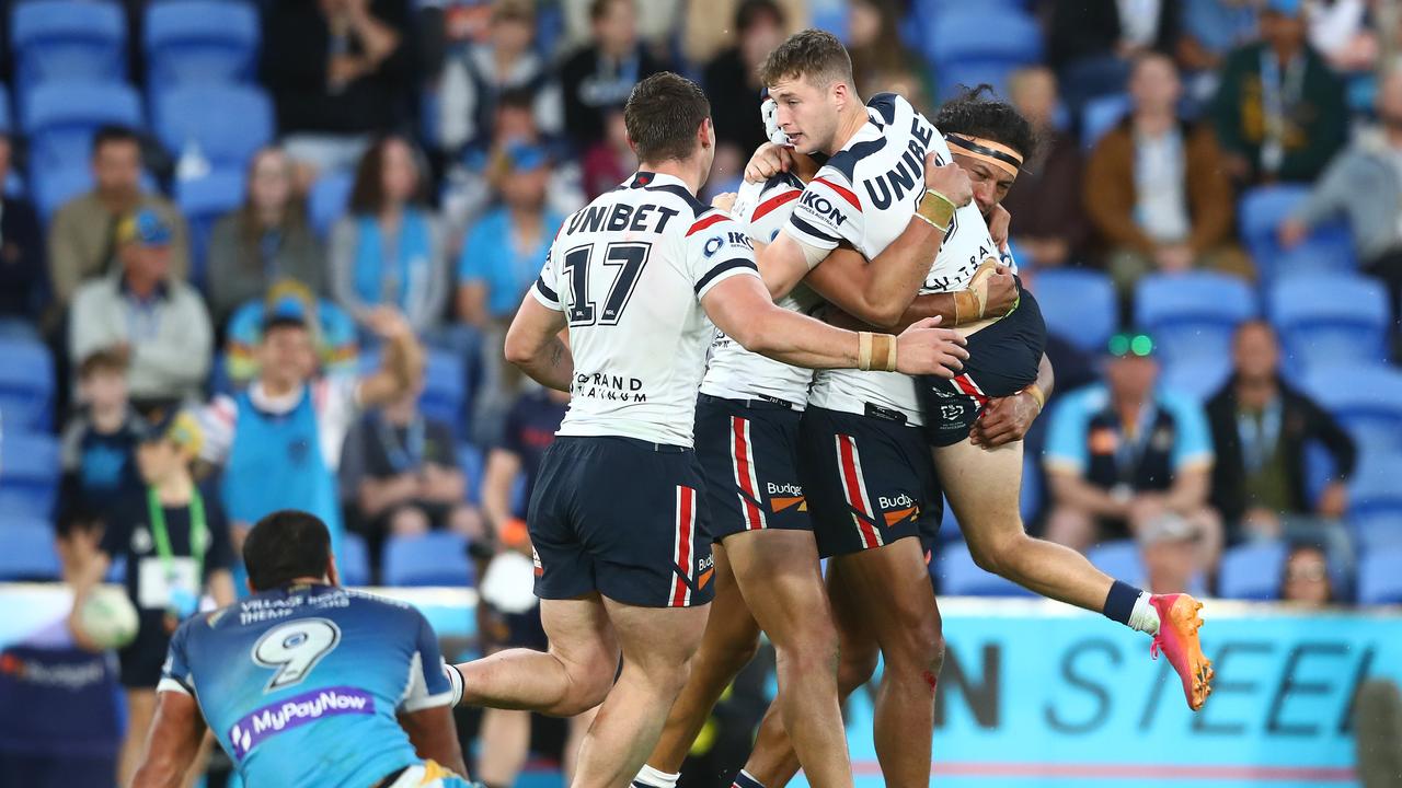 Sam Walker and the Roosters celebrate after kicking a matchwinning field goal. Picture: Getty Images.