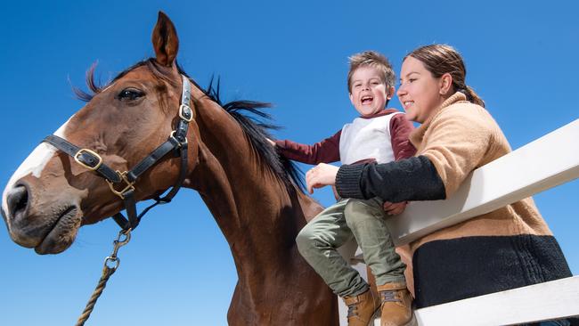 Sunbury mum Tegan Abercrombie with son Tyler, 5, and Melbourne Cup winner Prince of Penzance. Picture: Jason Edwards