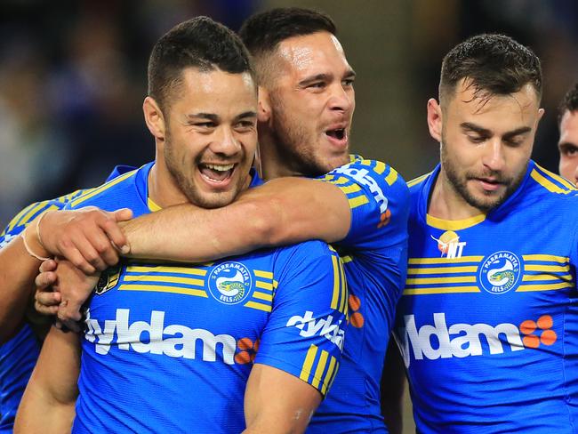 Corey Norman celebrates a Jarryd Hayne try. Picture: Mark Evans