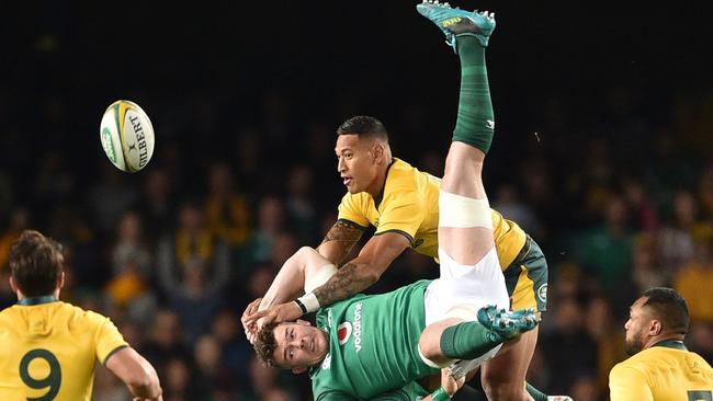 Folau’s challenge on Ireland's Peter O'Mahony goes wrong. Picture: AFP