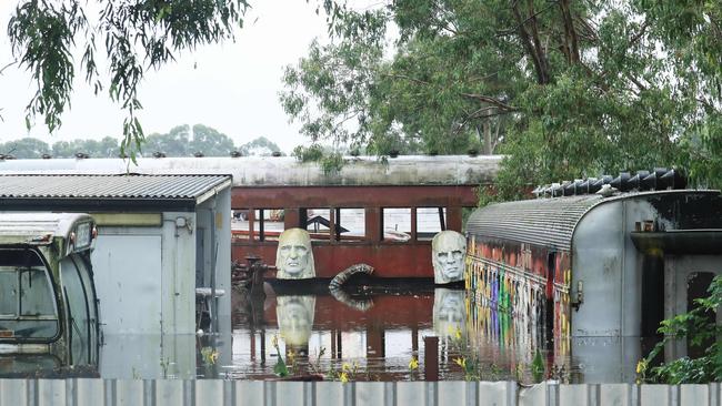 Gary Evans’s inundated Junk Yard at Londonderry, northwest Sydney. Picture: John Feder