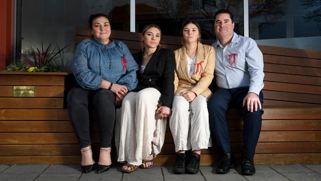 Sophia Naismith’s mother Pia, sisters Saskia and Ursula and father Luke Naismith on the bench that was specially built by Brighton Secondary year 12s in honour of Sophia. Picture: Tricia Watkinson