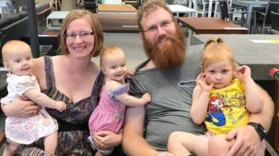 Kylie and Scott Burrage with their three girls.