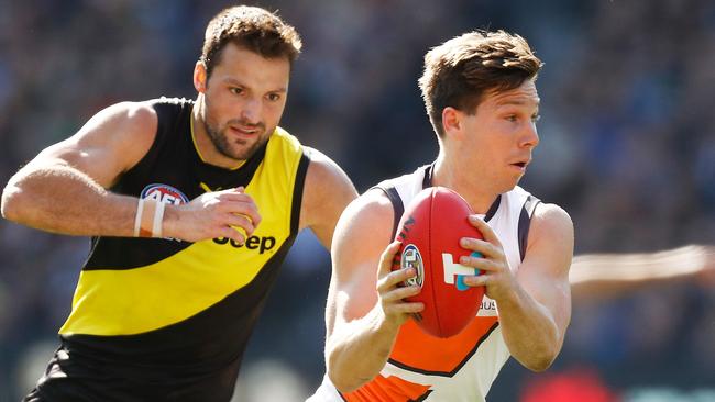 Giants superstar Toby Greene runs with the ball during the one-sided clash last year.