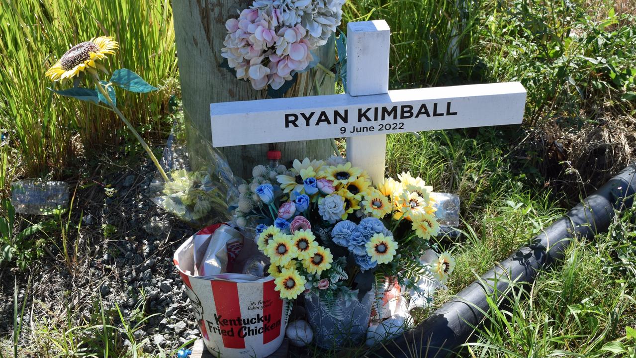 The roadside memorial to Ryan Kimball.