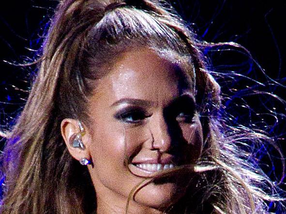 This June 4, 2014 photo released by Starpix shows singer Jennifer Lopez performing at Orchard Beach in Pelham Bay Park in the Bronx borough of New York. (AP Photo/Starpix, Kristina Bumphrey)