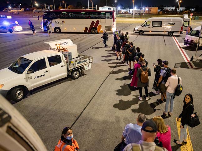 Passports please. Police check media Covid passports on Monday as the press pack arrives in WA. Picture: Jason Edwards