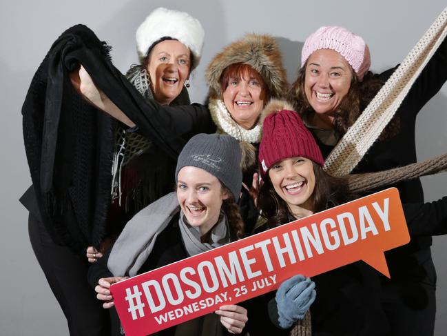 Staff at Gosford RSL (L-R back) Kim Golsby , Nola Ryan , Emma Benson , ( front) Kate Vane-Tempest , Georgia Ryan Pose with Scarfs , Beanies and Gloves which have been donated to their campaign drive. July 10 2018 ( AAP Image / Mark Scott )