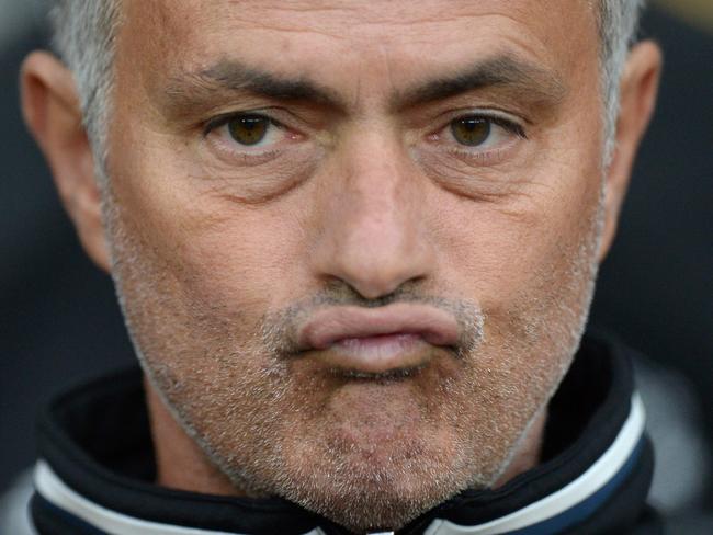 Manchester United's Portuguese manager Jose Mourinho waits for kick off of the friendly Wayne Rooney testimonial football match between Manchester United and Everton at Old Trafford in Manchester, northwest England, on August 3, 2016. / AFP PHOTO / OLI SCARFF