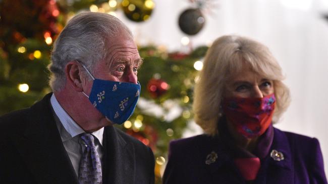 Prince Charles and Camilla, Duchess of Cornwall masked up to thank essential workers and volunteers at Windsor Castle. Picture: Glyn Kirk/Getty
