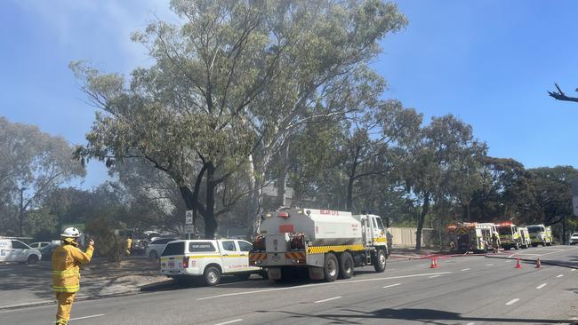 It is understood a 1960s era vintage car has been damaged by the flames. Picture: Ben Brennan