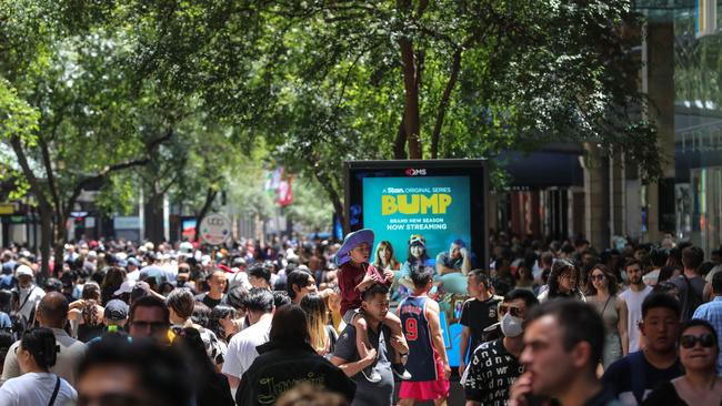 People flock to Pitt Street Mall during Boxing Day sales on December 26, 2022 in Sydney, Australia. Retailers offer massive discounts and enticing deals on the boxing day public holiday in Australia, attracting many shoppers who are keen to take advantage of bargains once Christmas is over. (Photo by Roni Bintang/Getty Images)