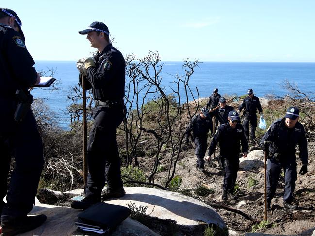 NSW Police search an area on North Head near Manly looking for evidence after a man was arrested earlier today over the 1988 murder of Scott Johnson. Picture: Toby Zerna