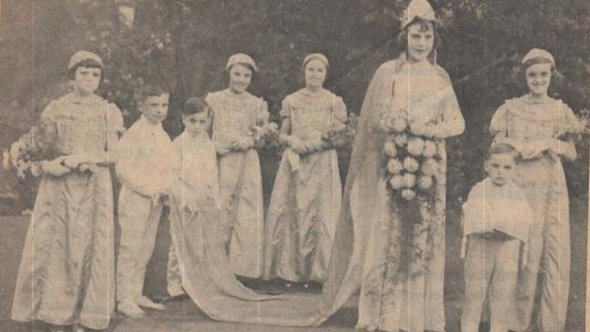 Sarah Patricia Blackburn (carrying a large flower bouquet) was the Ossett Common Carnival Queen in 1937. Picture: Supplied