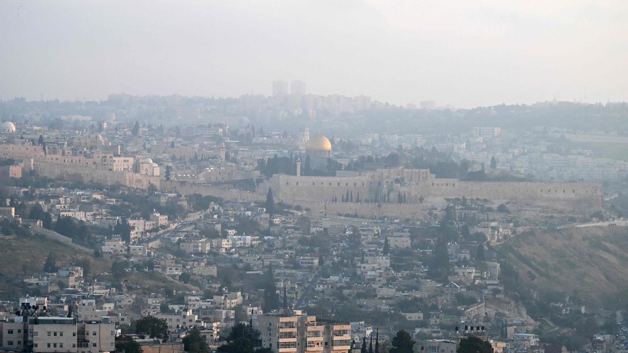 A panoramic view of Jerusalem's Old City is pictured at dawn of April 14, 2024, after Iran launched a drone and missile attack on Israel. Iran launched more than 200 drones and missiles on Israel in an unprecedented attack late April 13, 2024, the Israeli army announced, in a major escalation of the long-running covert war between the regional foes. (Photo by RONALDO SCHEMIDT / AFP)