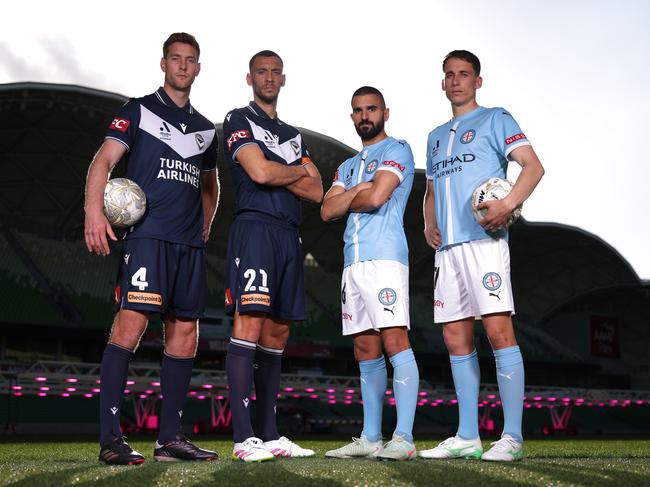 Melbourne Victory duo Lachlan Jackson and Roderick Miranda alongside Melbourne City’s Aziz Behich and Kai Trewin. Picture: Getty Images