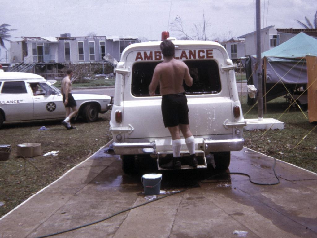 Peter Simms cleaning ambulances. Picture Supplied