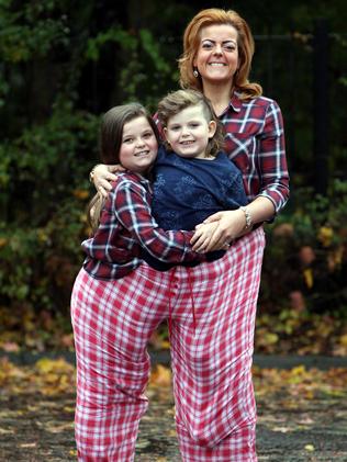 Nicola, with her children after the weight loss.