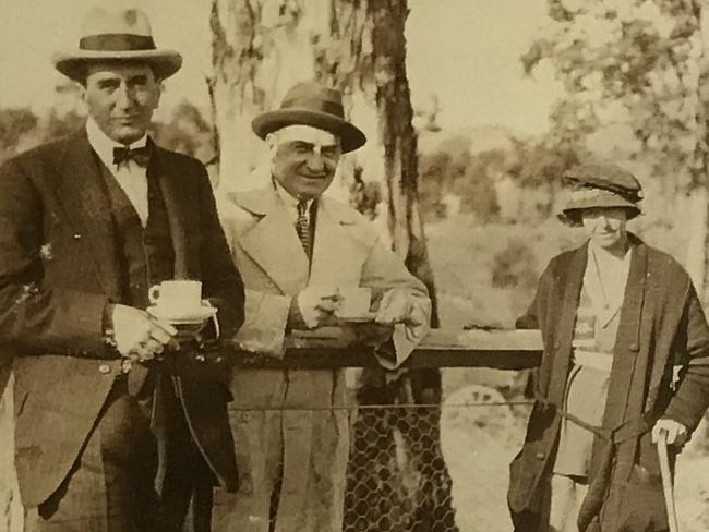 The unveiling of the Christmas Hills Mechanics Institute Hall memorial for fallen soldiers in 1921. Capt. Stanley Bruce (left), MC, MHR, later to be Prime Minister, unveiled the memorial. Rosamond Conway (right) helped to organise the construction.