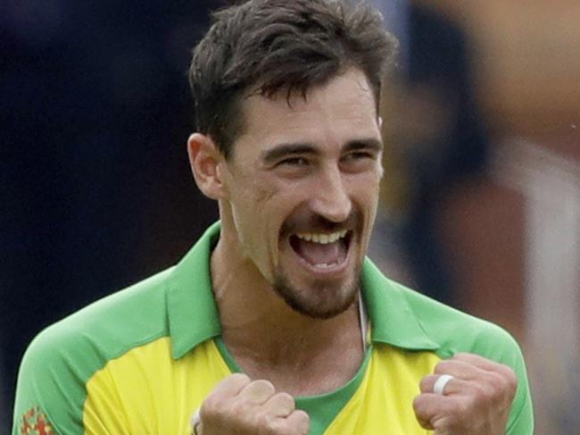 Australia's Mitchell Starc celebrates taking the wicket of England's captain Eoin Morgan during the Cricket World Cup match between England and Australia at Lord's cricket ground in London, Tuesday, June 25, 2019. (AP Photo/Matt Dunham)