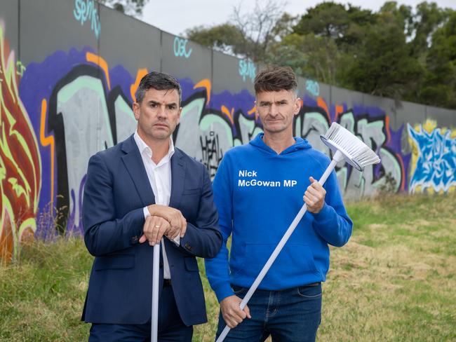 Brad Battin and Nick McGowan are proposing the Department of Transport be forced to clean up graffiti on freeways within 24 hours. Picture: Jason Edwards