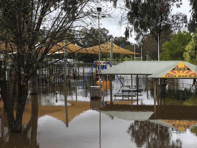 Lake Forbes floods over Apex Park yesterday. Picture: Dylan Robinson