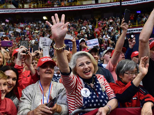 Trump - and the Republican party - still have plenty of female supporters, as this picture from a campaign rally at Chattanooga, Tennessee, reveals. Picture: Nicholas Kamm/AFP