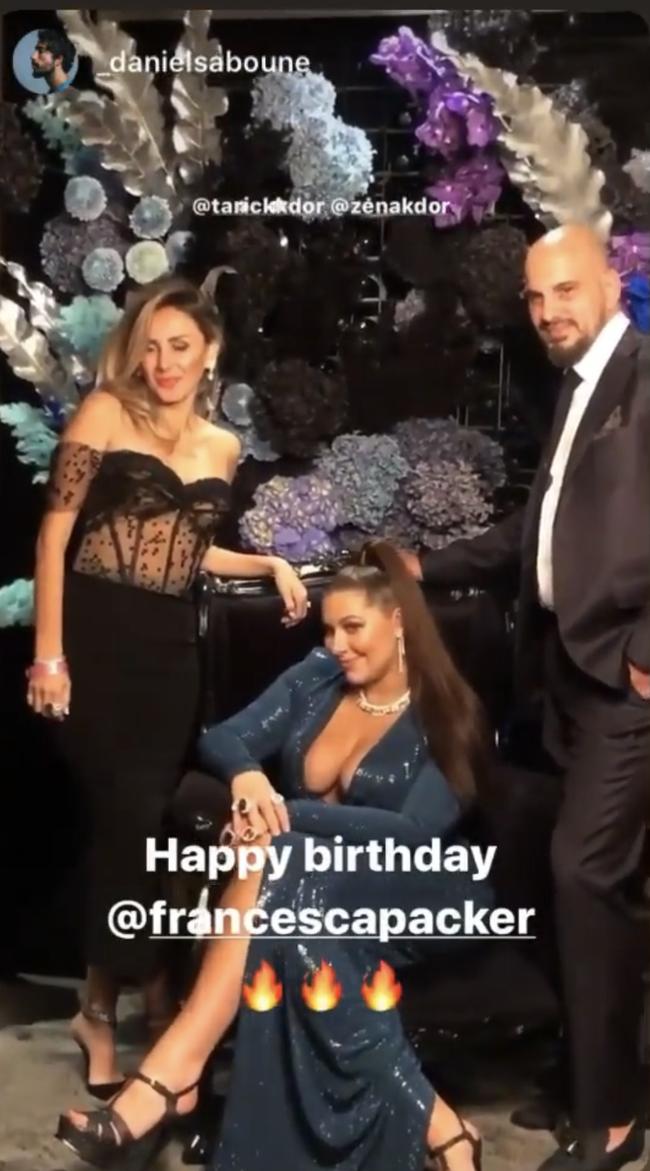 Francesca Packer (centre) stood out from her black-clad guests in a stunning blue gown. Picture: Instagram