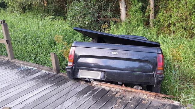 Police are investigating after a black Ford ute was left abandoned in a ditch off McKinnon Drive, Tewantin. Photo: Paul Garratt.