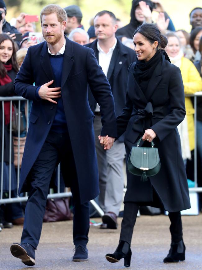 Prince Harry and Meghan Markle are seen during a walkabout at Cardiff Castle on January 18, 2018 in Cardiff, Wales. Picture: Getty