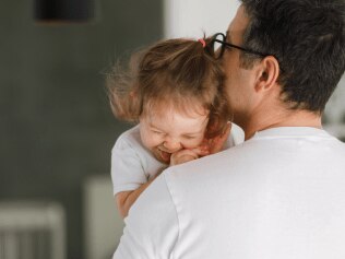 Father steps in to save his daughter from choking hazard. Source: iStock