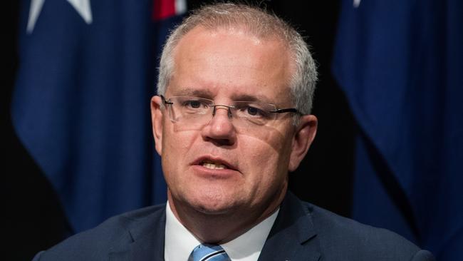 Prime Minister Scott Morrison holds a press conference with the heads of state following the Council of Australian Governments (COAG) meeting at the Cairns Convention Centre in Cairns, North Queensland, Friday, August 9, 2019. (AAP Image/Marc McCormack) NO ARCHIVING