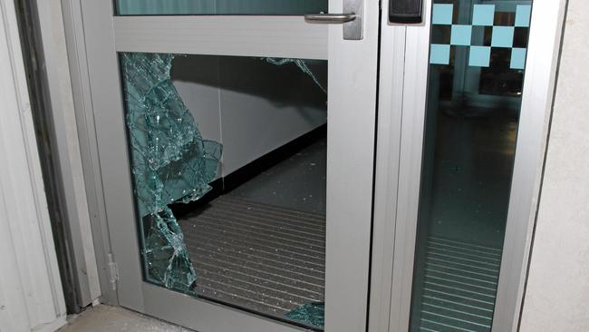 The back door at Bowen Police Station after 35-year-old Du Hai Le smashed his way in before being shot by police in October 2019. Picture: Queensland Police