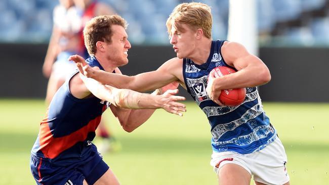 Jacob Kennerley, right, in action for the Cats in the VFL in 2019.