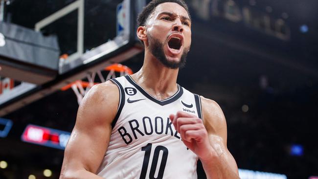 TORONTO, ON - NOVEMBER 23: Ben Simmons #10 of the Brooklyn Nets reacts after getting a block on Chris Boucher #25 of the Toronto Raptors during the second half of their NBA game at Scotiabank Arena on November 23, 2022 in Toronto, Canada. NOTE TO USER: User expressly acknowledges and agrees that, by downloading and or using this photograph, User is consenting to the terms and conditions of the Getty Images License Agreement.   Cole Burston/Getty Images/AFP (Photo by Cole Burston / GETTY IMAGES NORTH AMERICA / Getty Images via AFP)
