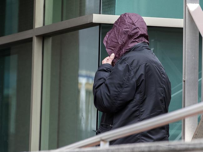 Allan Charles Kelly leaving the Hobart Magistrates Court on Monday after pleading guilty to causing the road death of British tourist Claire Litchfield.