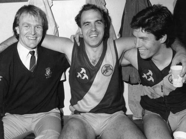 Footballer Peter Carey (c) with Graham Cornes and Stephen Kernahan after Peter's 350th match 1985.