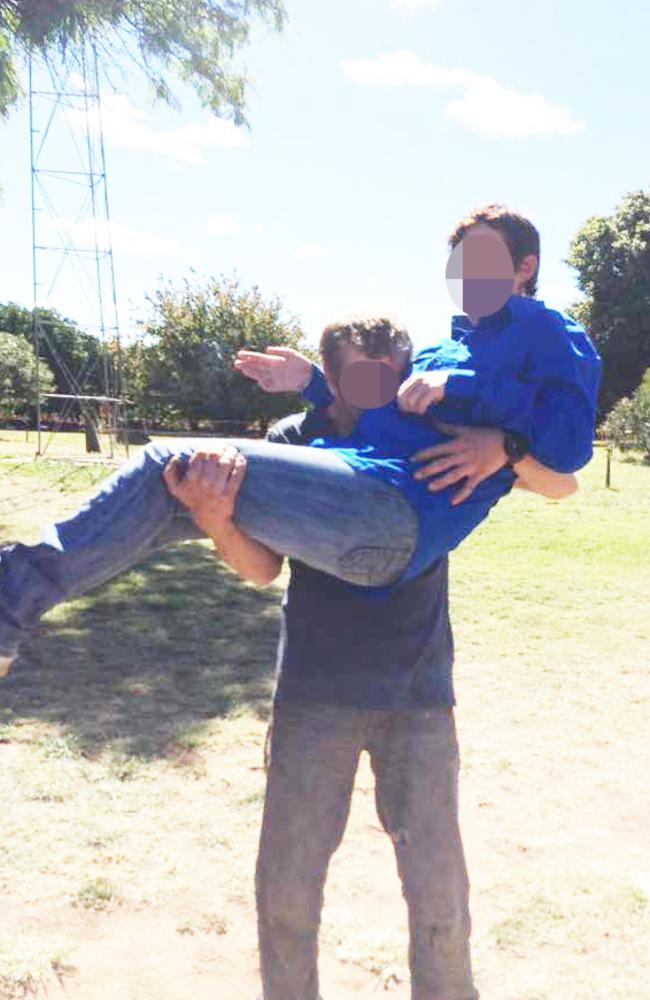 Raylene Colt is lifted up by her brother Joe on a farm possibly in South Australia.