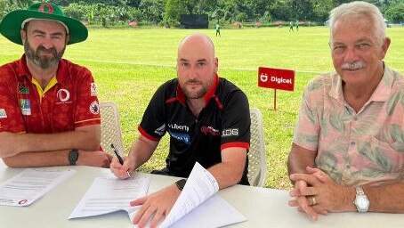 Chris Laffan signs as Vanuatu coach.