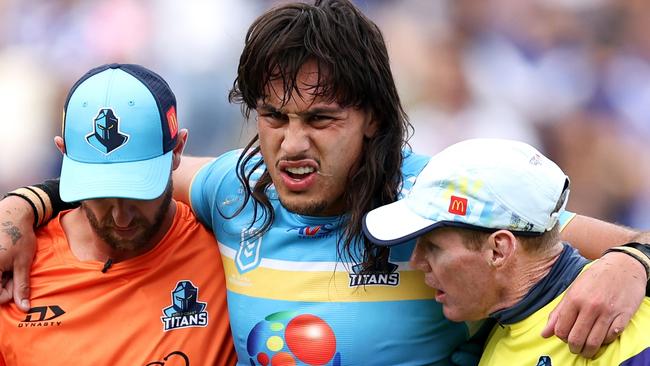 SYDNEY, AUSTRALIA - MARCH 23: Tino Fa'asuamaleaui of the Titans is helped from the field during the round three NRL match between Canterbury Bulldogs and Gold Coast Titans at Belmore Sports Ground, on March 23, 2024, in Sydney, Australia. (Photo by Brendon Thorne/Getty Images)