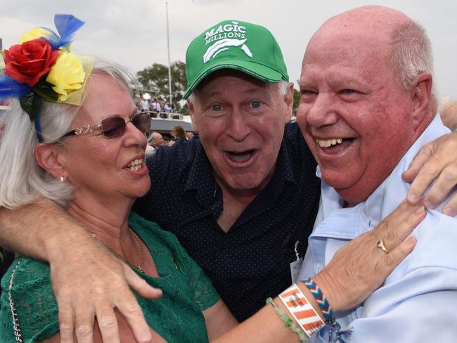 Winner of race 6  Alligator Blood owners  Allan Endresz, Robyn and Jeff Simpson celebrates at the Magic Millions race day at the Gold Coast Turf Club. (Photo/Steve Holland)