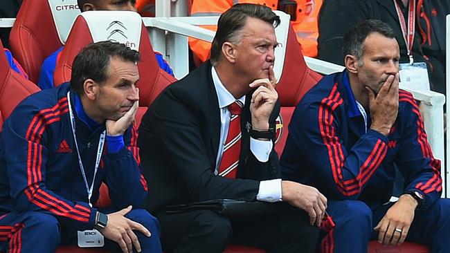 Former Manchester United manager Louis van Gaal (C).