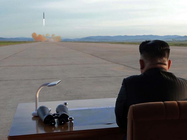 -- AFP PICTURES OF THE YEAR 2017 --  This undated picture released from North Korea's official Korean Central News Agency (KCNA) on September 16, 2017 shows North Korean leader Kim Jong-Un inspecting a launching drill of the medium-and-long range strategic ballistic rocket Hwasong-12 at an undisclosed location. Kim vowed to complete North Korea's nuclear force despite sanctions, saying the final goal of his country's weapons development is "equilibrium of real force" with the United States, state media reported on September 16.  / AFP PHOTO / KCNA VIA KNS / STR / South Korea OUT / REPUBLIC OF KOREA OUT   ---EDITORS NOTE--- RESTRICTED TO EDITORIAL USE - MANDATORY CREDIT "AFP PHOTO/KCNA VIA KNS" - NO MARKETING NO ADVERTISING CAMPAIGNS - DISTRIBUTED AS A SERVICE TO CLIENTS THIS PICTURE WAS MADE AVAILABLE BY A THIRD PARTY. AFP CAN NOT INDEPENDENTLY VERIFY THE AUTHENTICITY, LOCATION, DATE AND CONTENT OF THIS IMAGE. THIS PHOTO IS DISTRIBUTED EXACTLY AS RECEIVED BY AFP.  / - AFP PICTURES OF THE YEAR 2017 -