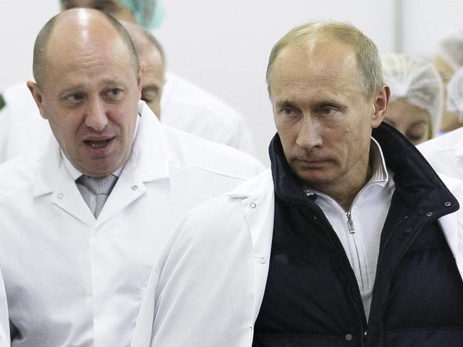 Yevgeny Prigozhin with Vladimir Putin in 2012. Picture: AP.