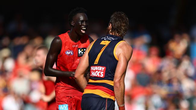 Mac Andrew (left) gets in Riley Thilthorpe’s face in the Suns’ one-point win. (Photo by Chris Hyde/Getty Images)