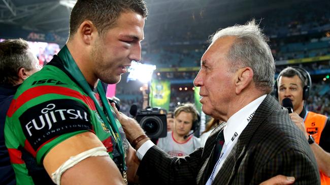 Burgess with Sattler after the 2014 grand final. (Gregg Porteous)