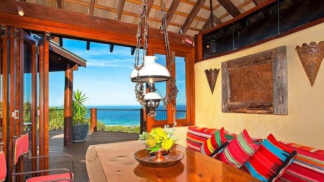 The house had a tropical yet rustic vibe in the living areas.