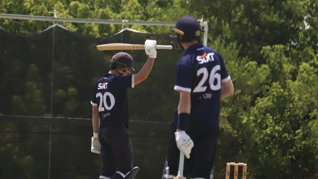 Josh Larkin raises the bat for his half century. Picture: Carey Neate.